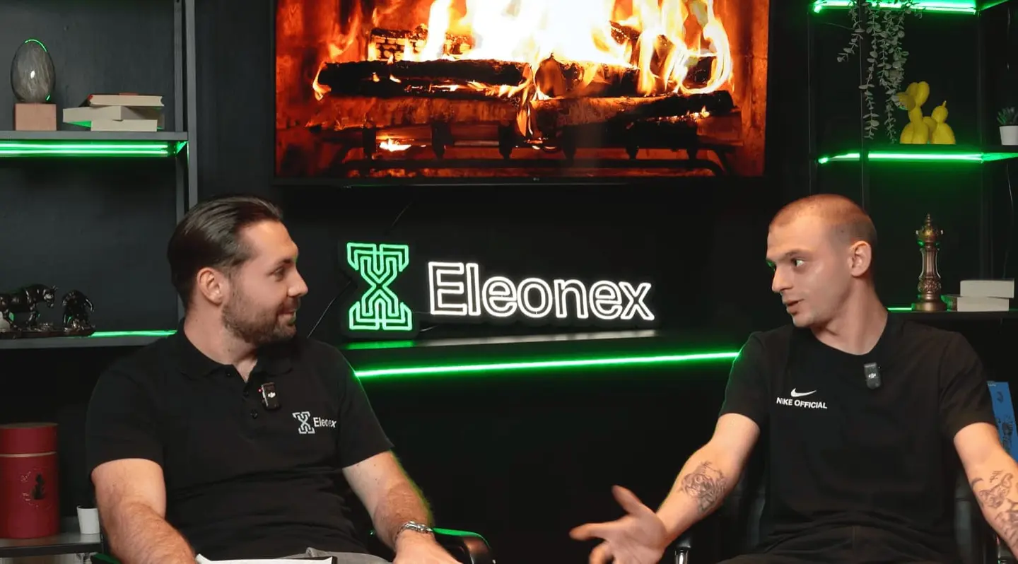 Two Eleonex team members talking on camera for a July recap interview